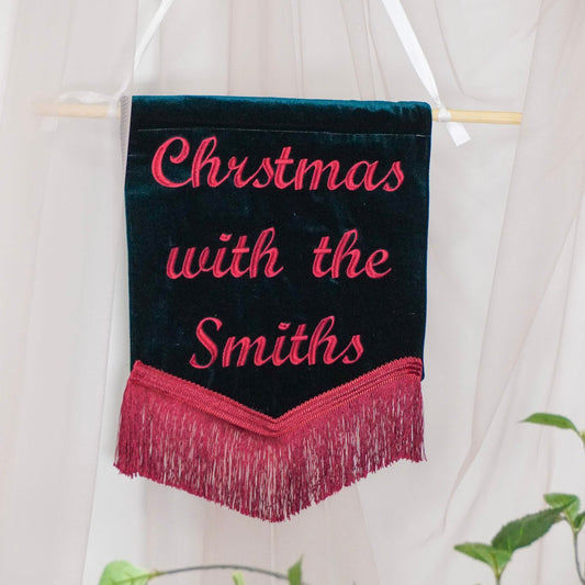 Personalised Green Velvet Christmas Banner – Custom Embroidered Family Name,  Red Fringe (30x34cm)