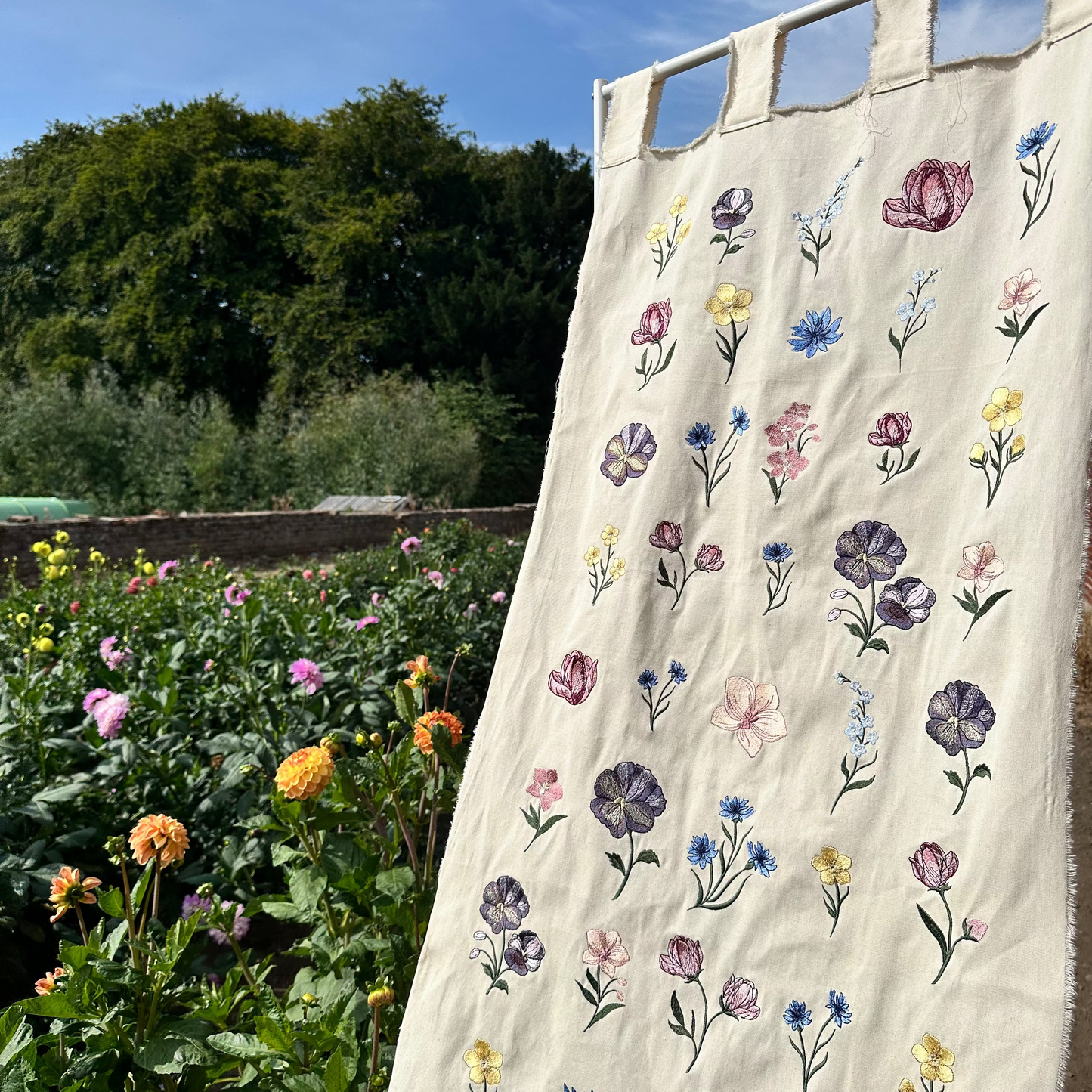 A collection of beautiful florals digitally embroidered on to a canvas banner