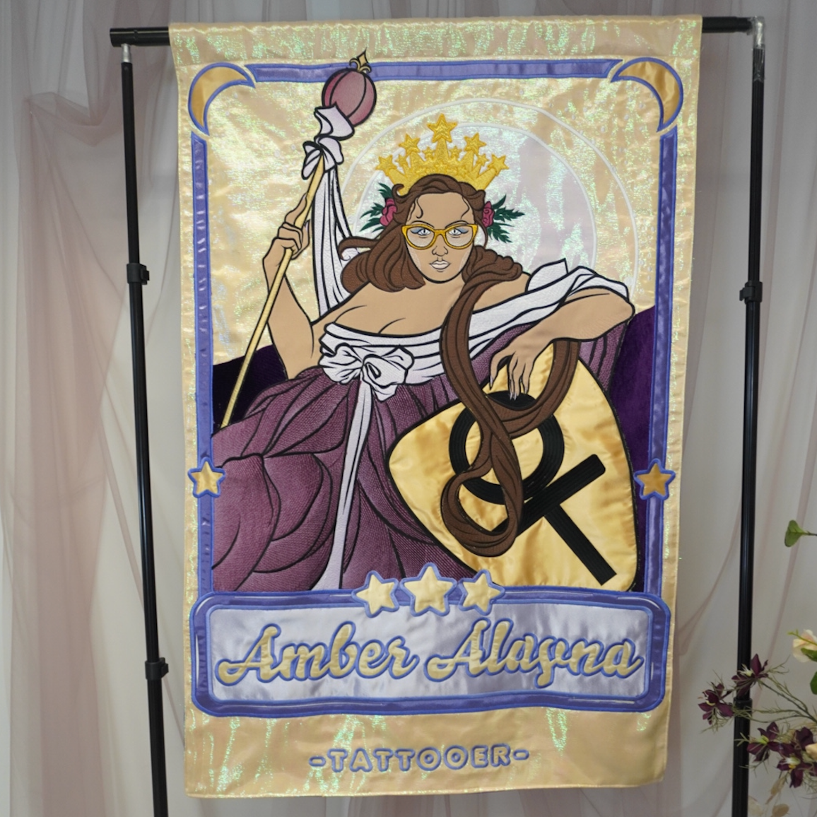 Bespoke Super Sizer banner in yellow and purple with 50+ appliqués, custom tattoo artist branding wall decor. Super Sizer bespoke banner in yellow and purple featuring over 50 appliqués, designed as custom branding for a tattoo artist. This premium, highly detailed banner is ideal for studio wall decor, helping independent tattoo businesses showcase their identity with bold, eye-catching artwork.