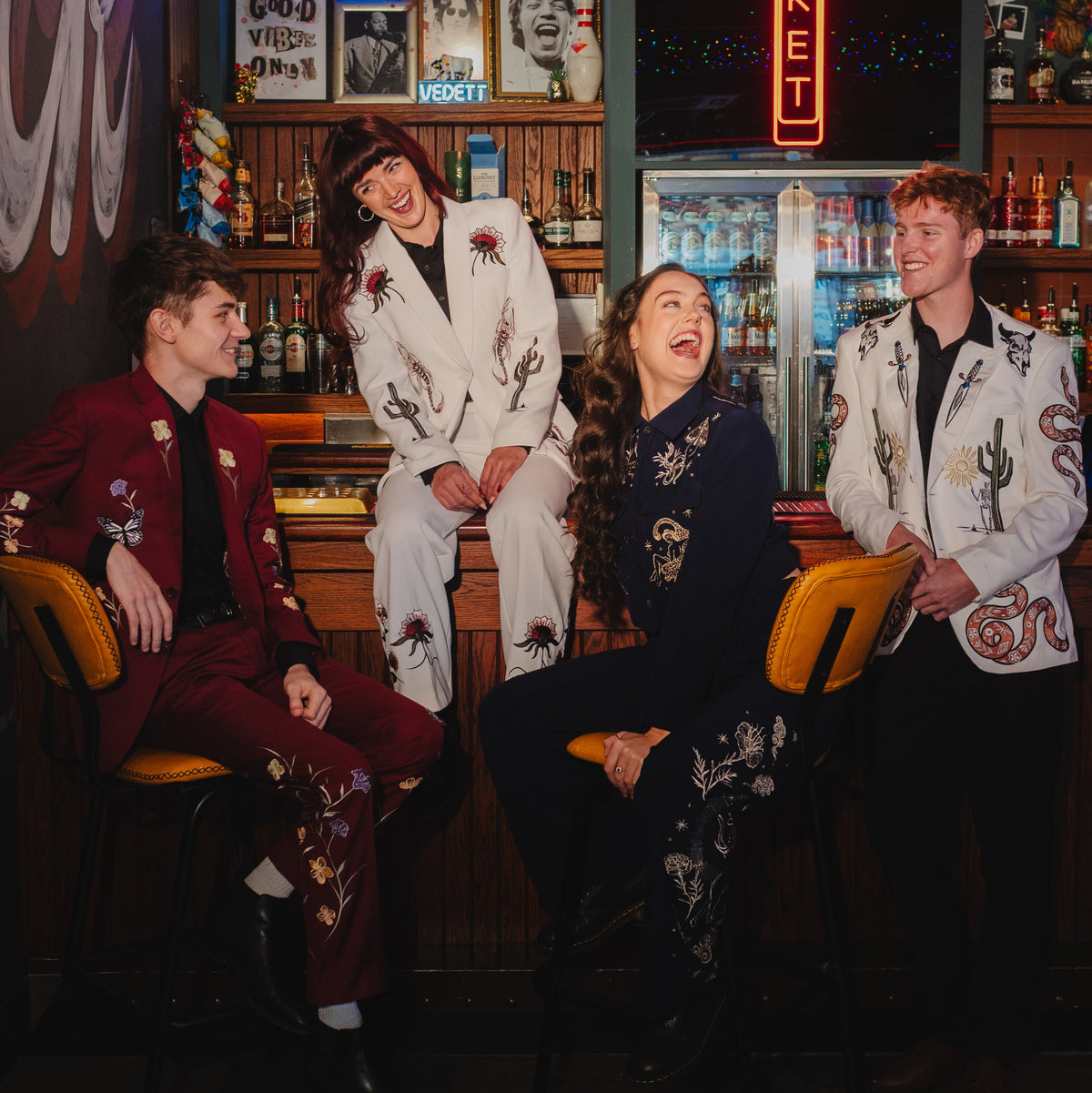 Digitally embroidered suit with intricate custom design, showcasing personalised occasionwear for self-expression.