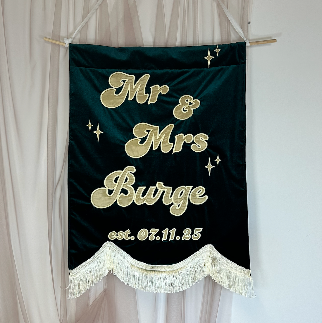 Custom embroidered banner.
Personalised banner with text.
Embroidered banner with name.
Custom fabric banner UK.
Personalised decorative banner.
Personalised handmade embroidered velvet wedding and occasion banner with tassel fringing, custom fabric event signage for bridal showers, wedding receptions, engagement parties and luxury celebrations