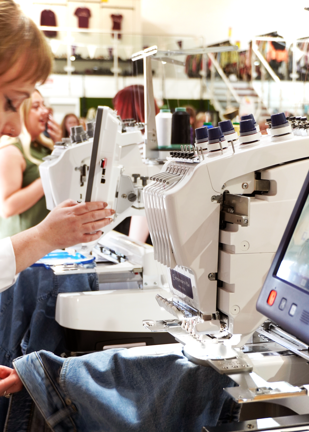 On-site embroidery in progress at a customer engagement event.
